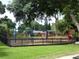 Community playground with swings and climbing equipment at 8905 South Bay Dr, Orlando, FL 32819