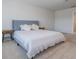 Serene bedroom showcasing a well-appointed bed with soft linens and minimalist nightstands at 9732 Brown Burrow St, Orlando, FL 32829