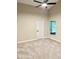 Cozy bedroom with neutral carpet, a window, and a ceiling fan at 1028 Henson Ct, Oviedo, FL 32765