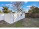 Backyard showcases a white wooden storage shed in the backyard at 10526 Fernando St, Orlando, FL 32825