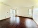 Bedroom features hardwood flooring, lots of natural light and sliding glass doors to a sun room at 10631 Deergrass Ln, Orlando, FL 32821