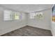 Spacious bedroom with wood-look flooring and natural light at 134 Roberta Rd, Ormond Beach, FL 32176
