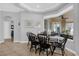 Inviting dining area with a view of the lanai, featuring a classic table and chair set at 1415 Crocus Ct, Longwood, FL 32750