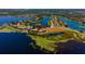 Scenic aerial view of the estate surrounded by serene lakes and luxurious properties at 14645 Isleview Dr, Winter Garden, FL 34787