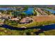 Overhead shot of luxury waterfront home with docks and natural scenery at 14645 Isleview Dr, Winter Garden, FL 34787