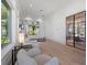 Bright gym with hardwood floors, large windows, and comfortable seating at 14645 Isleview Dr, Winter Garden, FL 34787