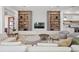 Comfortable living room with built-in shelves and modern décor at 14645 Isleview Dr, Winter Garden, FL 34787