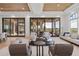 Inviting living room with sliding glass doors, modern furniture, and views of the pool and outdoor area at 14645 Isleview Dr, Winter Garden, FL 34787