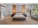 Comfortable main bedroom featuring a sitting area, neutral palette, and natural light at 14645 Isleview Dr, Winter Garden, FL 34787