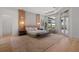 Spacious main bedroom with wood accents, tray ceilings, and balcony access at 14645 Isleview Dr, Winter Garden, FL 34787