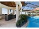 Amazing pool and spa in a screened enclosure that offers picturesque views of the outdoor living spaces at 14645 Isleview Dr, Winter Garden, FL 34787