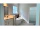 Stylish bathroom with a soaking tub and modern vanity at 15369 Sw 60Th Cir, Ocala, FL 34473