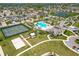 Resort-style community amenities including a tennis court, volleyball court, pool, and clubhouse at 16084 Black Hickory Dr, Winter Garden, FL 34787