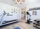 Well-equipped exercise room with treadmill and fitness equipment at 16084 Black Hickory Dr, Winter Garden, FL 34787