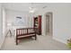 Bright bedroom with neutral walls, carpet and a bookshelf at 2090 Common Way Rd, Orlando, FL 32814