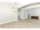 Spacious living area featuring wood-style flooring and a neutral color palette at 2351 Kelbrook Ct, Oviedo, FL 32765