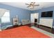 A luxurious main bedroom features a large bed, dresser, and access to the bathroom at 2351 Kelbrook Ct, Oviedo, FL 32765