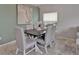 Elegant dining room with a dark wood table and seating for six, adjacent to living space at 275 Clydesdale Cir, Sanford, FL 32773