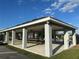 Interior view of the community pavilion featuring picnic tables and ceiling fans at 275 Clydesdale Cir, Sanford, FL 32773