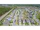 Aerial view showcasing the community with well-maintained homes, lush green spaces, and picturesque streets at 2820 Black Birch Dr, Ocoee, FL 34761
