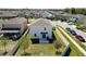 Aerial view of home featuring fenced backyard, complemented by landscaping and a view of the surrounding neighborhood at 2820 Black Birch Dr, Ocoee, FL 34761