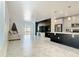 Open-concept living room features neutral tones, tile flooring, and sliding glass doors for seamless indoor-outdoor living at 2820 Black Birch Dr, Ocoee, FL 34761