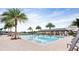 Community pool with lounge chairs and a covered pavilion at 2820 Black Birch Dr, Ocoee, FL 34761