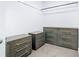 Spacious walk-in closet with multiple dressers provides ample storage for clothing and accessories at 2820 Black Birch Dr, Ocoee, FL 34761