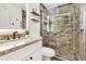 Stylish bathroom with a glass shower and modern fixtures at 30041 Redoak Ave, Eustis, FL 32736