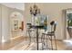 Charming breakfast nook with a view of the outdoors and stylish chandelier at 30041 Redoak Ave, Eustis, FL 32736