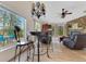 Inviting living area with a view of the fireplace and the outdoors at 30041 Redoak Ave, Eustis, FL 32736