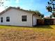 Spacious backyard featuring a wooden fence, perfect for enjoying the outdoors in privacy at 3106 Garden Ct, St Cloud, FL 34769