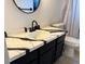 Bathroom with vanity with unique countertop and modern fixtures at 3106 Garden Ct, St Cloud, FL 34769