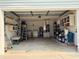 Spacious garage with ample storage and functional organization at 3106 Garden Ct, St Cloud, FL 34769