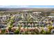 Stunning aerial view of a residential area featuring neatly arranged homes near a lake at 3121 Bellingham Dr, Orlando, FL 32825