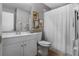 Cozy bathroom features a white vanity and shower with decorative accents at 3121 Bellingham Dr, Orlando, FL 32825