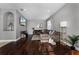 This living room features wood floors, neutral colors, and ample natural light at 3121 Bellingham Dr, Orlando, FL 32825