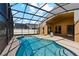 Relaxing screened pool and covered patio area create an ideal outdoor living space at 3180 Town And Country Rd, Oviedo, FL 32766