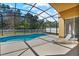 Inviting screened pool with lounge chair offering a relaxing outdoor space at 3180 Town And Country Rd, Oviedo, FL 32766