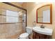 Updated bathroom with glass-enclosed shower and modern vanity at 3403 Great Pond Dr, Kissimmee, FL 34746