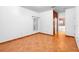 Bedroom with terracotta tile flooring, a window, and an ensuite bathroom at 3403 Great Pond Dr, Kissimmee, FL 34746