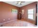 Bedroom with tile flooring and brown accent wall at 3403 Great Pond Dr, Kissimmee, FL 34746