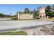 Community entrance featuring the 'Bellalago' sign and stone architecture, marking a welcoming gateway at 3403 Great Pond Dr, Kissimmee, FL 34746