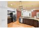 Kitchen with granite countertops, stainless steel appliances, and ceramic tile flooring at 3403 Great Pond Dr, Kissimmee, FL 34746