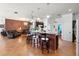 Modern kitchen featuring a breakfast bar with seating, seamlessly flowing into the living room at 3403 Great Pond Dr, Kissimmee, FL 34746