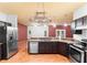 Well-equipped kitchen with granite countertops and stainless steel appliances at 3403 Great Pond Dr, Kissimmee, FL 34746