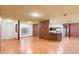 Open concept living area featuring tile flooring and an abundance of natural light at 3403 Great Pond Dr, Kissimmee, FL 34746
