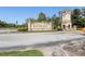 Bellalago entrance featuring a welcoming monument sign and stone tower at 3403 Great Pond Dr, Kissimmee, FL 34746