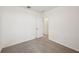 Carpeted bedroom with an open closet at 4010 Copperleaf Ln, Poinciana, FL 34759