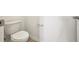 This is a close-up shot of a toilet with a white ceramic base and a white tank at 4010 Copperleaf Ln, Poinciana, FL 34759